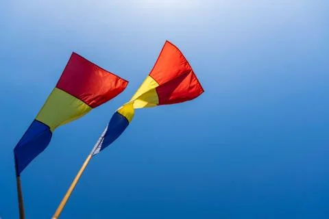 The flag of Romania in the wind Stock Photos