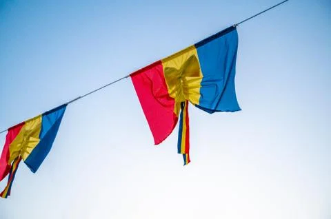 The flag of Romania in the wind Stock Photos