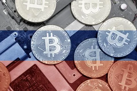 Flag of russia on the bitcoins with computer electronic circuit board backg.. Stock Photos