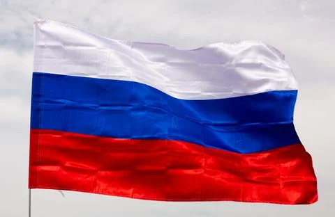 Flag Russia on clouded sky 写真素材