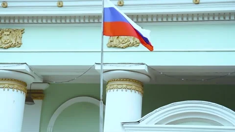 Flag of Russia develops in wind. Government Building. State Institution of Stock Footage 209282294