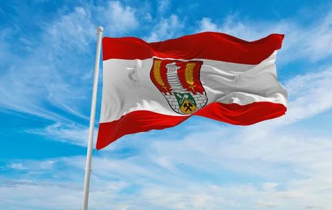 Flag of Salzgitter at cloudy sky background on sunset, panoramic view. Federa Stock Illustration
