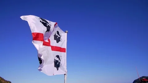 Flag Saredgna blue sky Stock Footage 76275273