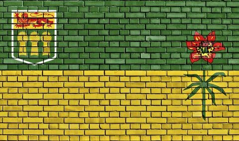 Flag of Saskatchewan painted on brick wall Stock Illustration