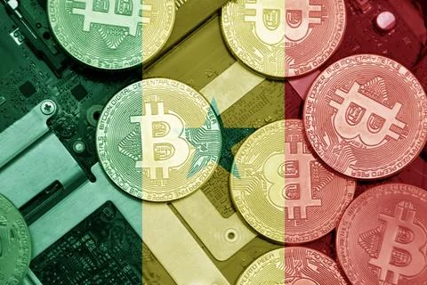 Flag of senegal on the bitcoins with computer electronic circuit board back.. Stock Photos