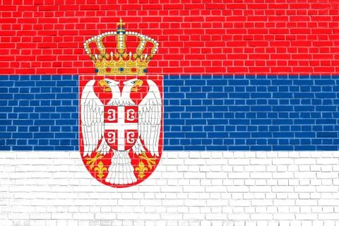 Flag of Serbia on brick wall texture background Stock Illustration