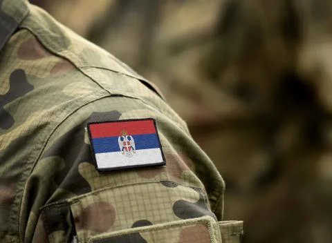 Flag of Serbian Krajina on military uniform. Army, armed forces, soldiers. Co Stock Photos