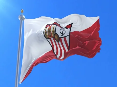 Flag of Sevilla Football Clup waving at wind, loop Stock Footage