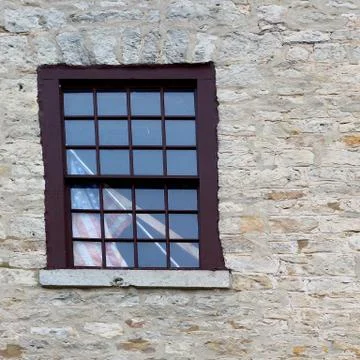 A flag in a single window. Stock Photos