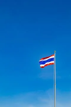 A flag is in the sky and clouds and beautiful Stock Photos
