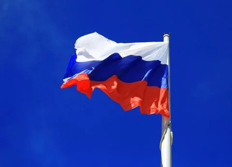 Flag on the sky background Stock Photos