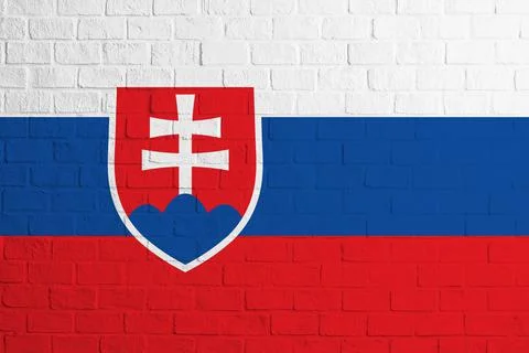 Flag of Slovakia. Brick wall texture of the flag of Slovakia Stock Photos