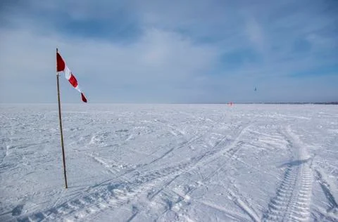 Flag in the snow Stock Photos
