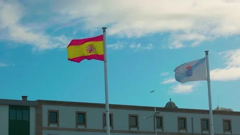 The flag of Spain and Galicia develops in the wind Stock Footage 197023195