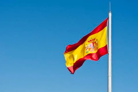 Flag of spain waving in the wind Foto stock