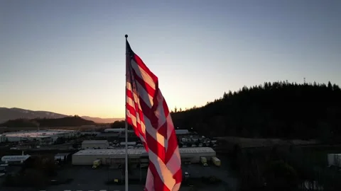 Flag sunrise orbit left Stock Footage 238034437