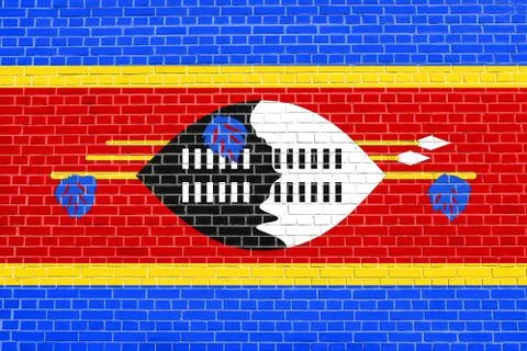 Flag of Swaziland on brick wall texture background Illustrazione stock