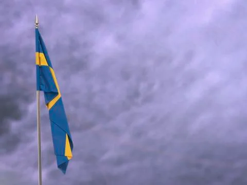 Flag of Sweden hanging down dangling Stock Photos