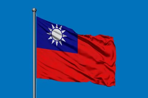 Flag of Taiwan waving in the wind against deep blue sky. Taiwanese flag. Stock Photos