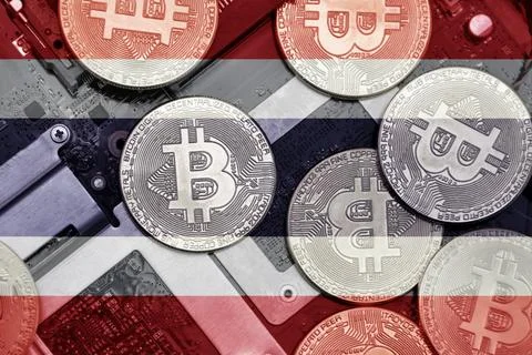 Flag of thailand on the bitcoins with computer electronic circuit board backg Stock-Fotos