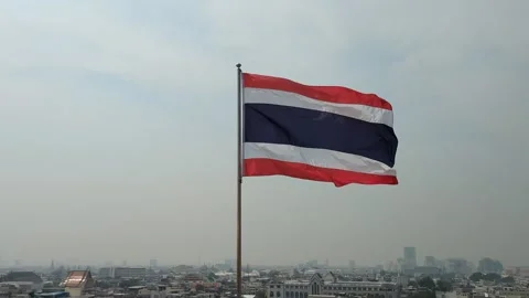The flag of Thailand waving in the wind, view from rooftop Stock Footage 314321961
