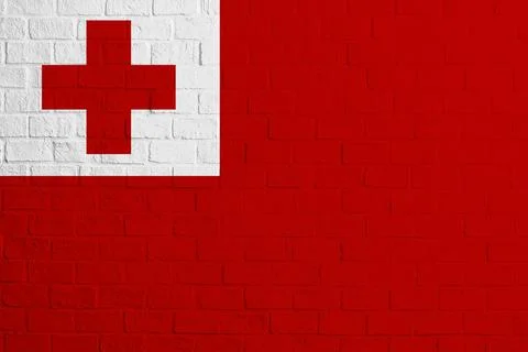 Flag of Tonga. Brick wall texture of the flag of Tonga Stock Photos