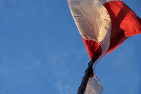 Flag on top of a flying pole Photos