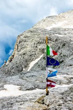 Flag on the top of the mountain Stock Photos