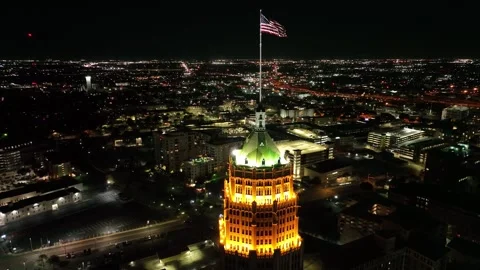 Flag on a Tower at Night Drone Aerial View San Antonio Texas USA Video stock 335667824