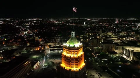 Flag on a Tower at Night Drone Aerial View San Antonio Texas USA Stock Footage 335667835