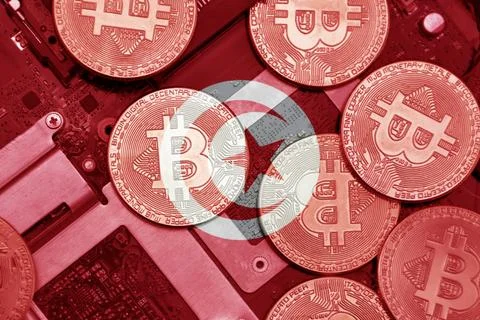 Flag of tunisia on the bitcoins with computer electronic circuit board back.. Stock Photos