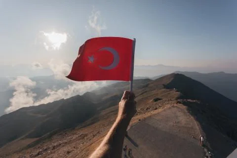 Flag of Turkey against the backdrop of Taurus Mountains Stock Photos