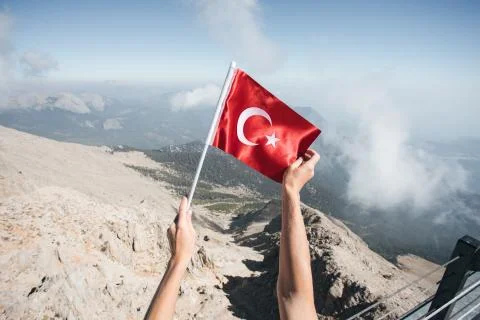 Flag of Turkey against the backdrop of Taurus Mountains Stock Photos