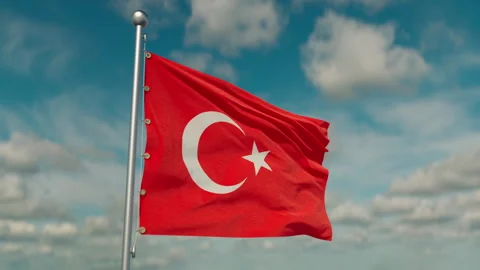The flag of Turkey flutters in the gentle wind, the camera flies around it Stock Footage 242406548