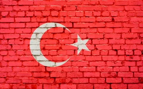 Flag of Turkey painted on brick wall, background texture Stock Photos