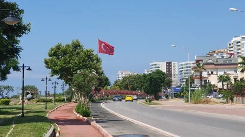 Flag of Turkey waving in wind against cloudy sky. National flag of Turkish flutt Video stock 240843017