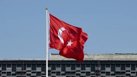 Flag of Turkey waving in wind inside Taksim square of Istanbul Stock Footage 70355117