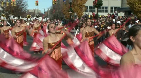 Flag twirlers at parade Stock Footage
