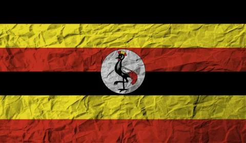 Flag of Uganda with old texture. Vector Stock Illustration