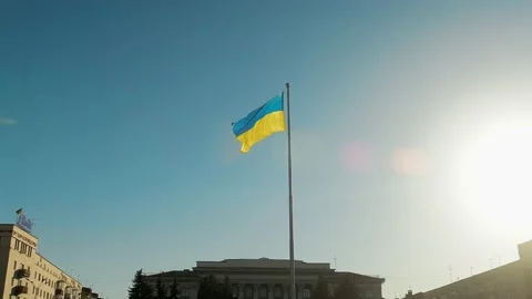 Flag of Ukraine against the backdrop of sunrise. Yellow-blue flag of Ukraine Stock-Footage 190063953