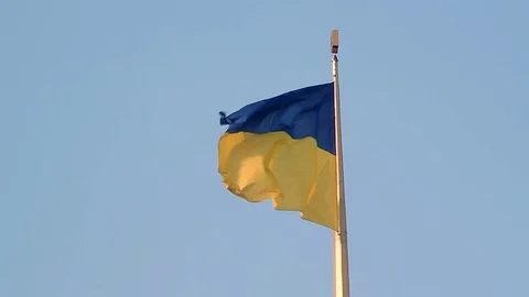 Flag of Ukraine in the blue sky Stock Footage 74978889