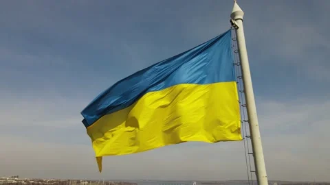 The flag of ukraine is developing in the wind, a view of the dam, the Dnieper Stock Footage 151460080