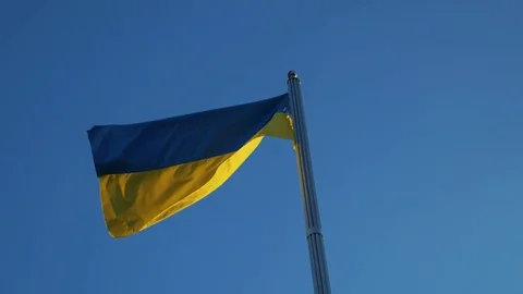 The flag of Ukraine dissipates in the wind Stock Footage 82142591