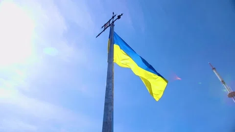 The flag of Ukraine flutters in the wind Stock Footage 171586880