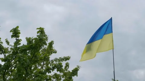 Flag of ukraine slowmotion. War in Ukraine. Flag of Ukraine against a dramatic Video stock 201527675