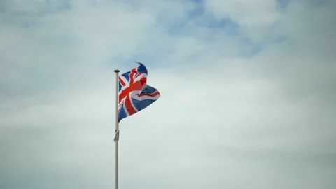 Flag of United Kingdom blowing in wind, Union Jack Stock-Footage 239013784