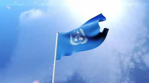 Flag of the United Nations Waving in the Wind in Slow Motion Stock Footage 101294460
