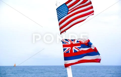 Flag of united states of america and state of hawaii flying on a ship mast on Stock Photos