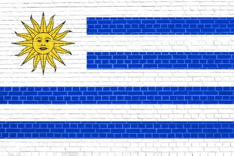 Flag of Uruguay on brick wall texture background Stock Photos