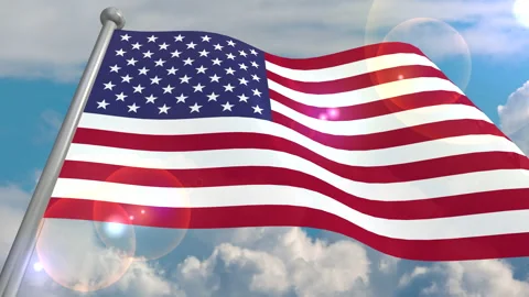 The flag of the US state develops in the wind against a blue sky Vidéo 134574701